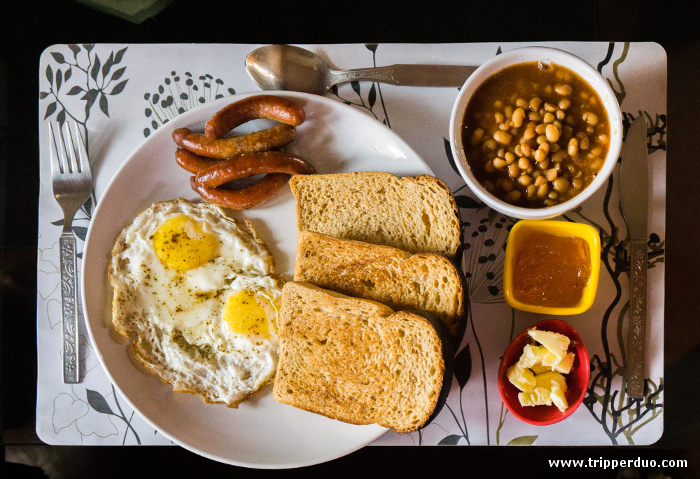 Pork Breakfast Platter - Fried eggs, pork sausages, baked beans, marmalade, butter and toasts. Bacons were not available that day.