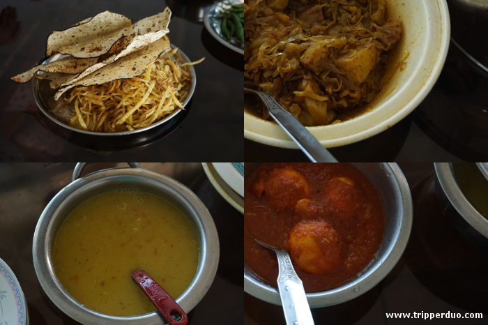 The basic but delicious lunch. Clockwise from top left papad &amp; fried shredded potato, cabbage and potato vegetable, egg curry and daal (lentil soup)